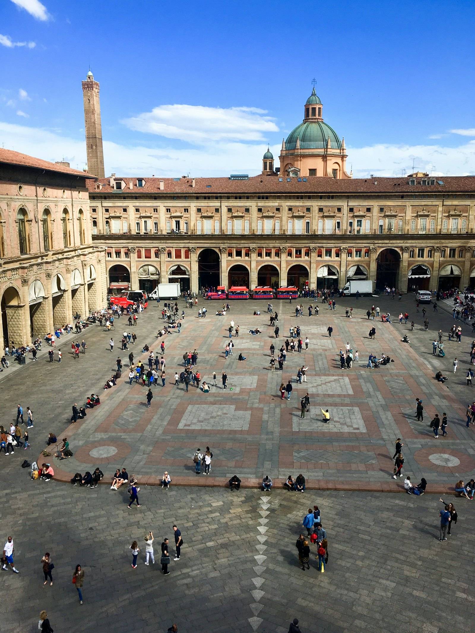 Piazza Maggiore from above, with people walking
